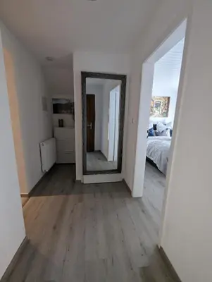 Ein Bett oder Betten in einem Zimmer der Unterkunft Ferienwohnung an der historischen Stadtmauer