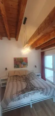 Ein Bett oder Betten in einem Zimmer der Unterkunft Birkennest