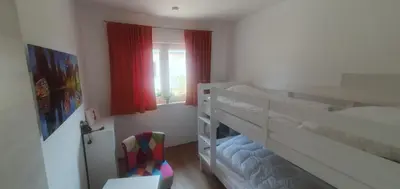 Ein Bett oder Betten in einem Zimmer der Unterkunft Birkennest