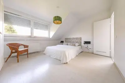 Ein Bett oder Betten in einem Zimmer der Unterkunft Neue Wohnung in der Nähe von Trier