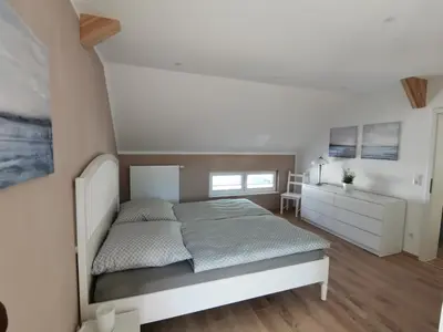 Ein Bett oder Betten in einem Zimmer der Unterkunft Ferienwohnung Dörrebach im Soonwald bei Bingen