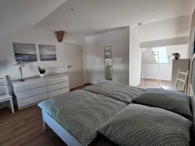 Ein Bett oder Betten in einem Zimmer der Unterkunft Ferienwohnung Dörrebach im Soonwald bei Bingen
