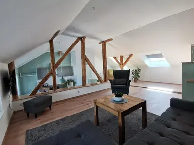 Ein Sitzbereich in der Unterkunft Ferienwohnung Dörrebach im Soonwald bei Bingen