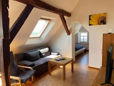 Ein Sitzbereich in der Unterkunft Ferienhaus Beller Gehaichnis