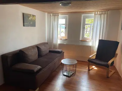 Ein Sitzbereich in der Unterkunft Ferienhaus Beller Gehaichnis