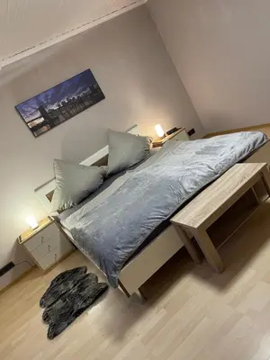 Ein Bett oder Betten in einem Zimmer der Unterkunft Ferienwohnung Moselherz