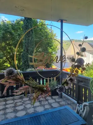 Ein Balkon oder eine Terrasse in der Unterkunft R(h)einzeit