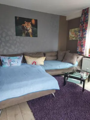 Ein Bett oder Betten in einem Zimmer der Unterkunft FERIENWOHNUNG Marina
