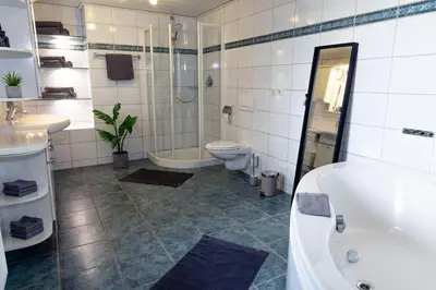 Ein Badezimmer in der Unterkunft Vulkan-Lodge Ferienhaus