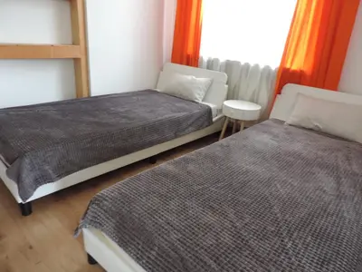 Ein Bett oder Betten in einem Zimmer der Unterkunft Julia's Mosel Villa Appartement JULIA