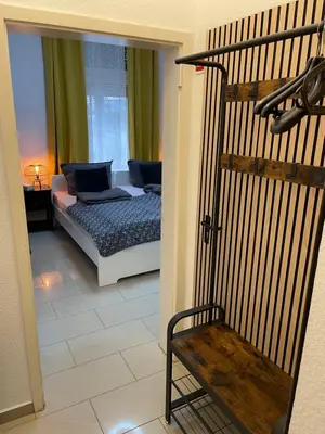 Ein Bett oder Betten in einem Zimmer der Unterkunft Schönes Apartment am Rhein - Zentral