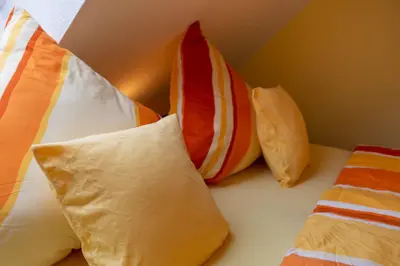Ein Bett oder Betten in einem Zimmer der Unterkunft Ferienwohnung Alexander