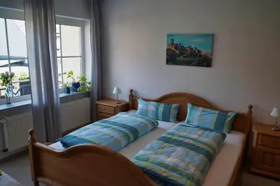 Ein Bett oder Betten in einem Zimmer der Unterkunft Im Beilsteiner Mühlental