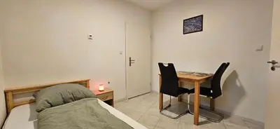 Ein Bett oder Betten in einem Zimmer der Unterkunft Vulkaneifeloase optional mit Sauna