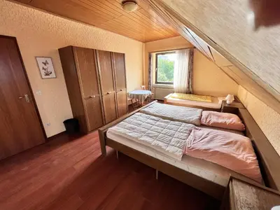 Ein Bett oder Betten in einem Zimmer der Unterkunft Landgasthof Zum Anker