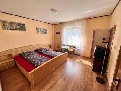 Ein Bett oder Betten in einem Zimmer der Unterkunft Landgasthof Zum Anker