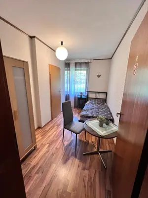 Ein Bett oder Betten in einem Zimmer der Unterkunft Landgasthof Zum Anker