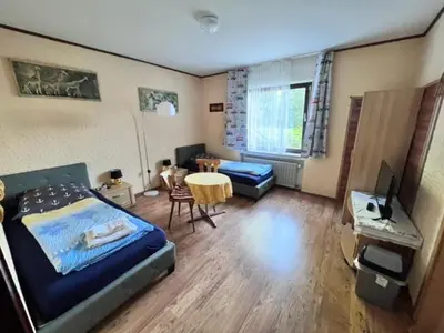 Ein Bett oder Betten in einem Zimmer der Unterkunft Landgasthof Zum Anker