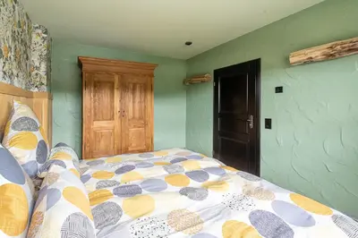 Ein Bett oder Betten in einem Zimmer der Unterkunft Einzigartige Traumwohnung mit Whirlpool & Sauna bietet Luxus und Erholung