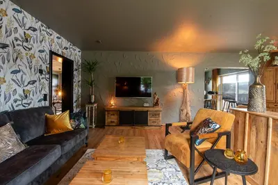 Ein Sitzbereich in der Unterkunft Einzigartige Traumwohnung mit Whirlpool & Sauna bietet Luxus und Erholung