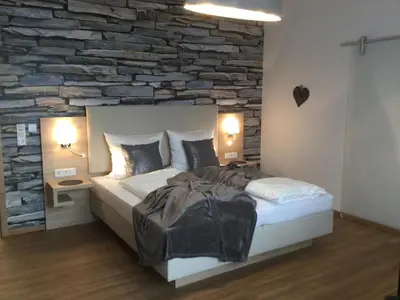 Ein Bett oder Betten in einem Zimmer der Unterkunft Weingut Bastian