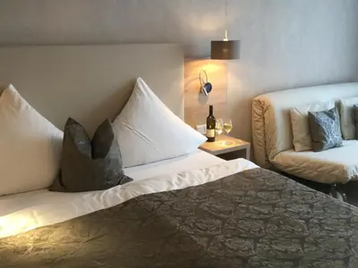 Ein Bett oder Betten in einem Zimmer der Unterkunft Weingut Bastian