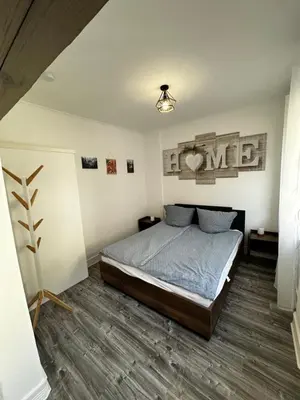 Ein Bett oder Betten in einem Zimmer der Unterkunft Ferienhaus Zur Gasse