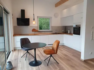 Küche/Küchenzeile in der Unterkunft MV Römervilla, Lofts & Penthouses mit traumhaftem Moselpanoramablick und Sauna
