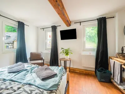 Ein Bett oder Betten in einem Zimmer der Unterkunft Holiday Home Near the Rhine River