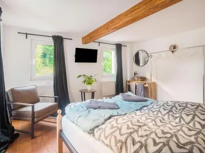 Ein Bett oder Betten in einem Zimmer der Unterkunft Holiday Home Near the Rhine River