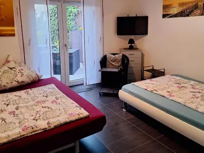 Ein Bett oder Betten in einem Zimmer der Unterkunft Rheinblick