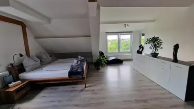 Ein Bett oder Betten in einem Zimmer der Unterkunft Ferienwohnung mit Weitblick