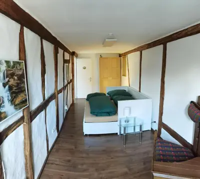 Ein Sitzbereich in der Unterkunft Ferienhaus Zur kleinen Hummel 5 DTV-Sterne