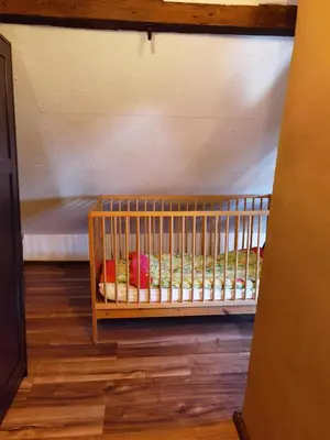 Ein Bett oder Betten in einem Zimmer der Unterkunft Ferienhaus Zur kleinen Hummel 5 DTV-Sterne