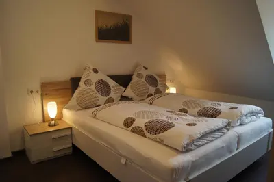 Ein Bett oder Betten in einem Zimmer der Unterkunft Wein- & Ferienhaus Jörg Weirich