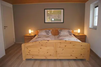 Ein Bett oder Betten in einem Zimmer der Unterkunft Wein- & Ferienhaus Jörg Weirich