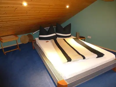 Ein Bett oder Betten in einem Zimmer der Unterkunft Eifel Panoramablick