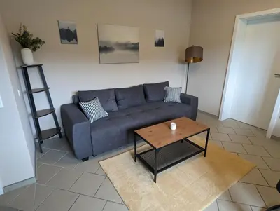 Ein Sitzbereich in der Unterkunft Ferienwohnung Rheinperle