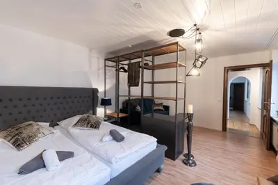 Ein Bett oder Betten in einem Zimmer der Unterkunft Hotel Porta Nigra