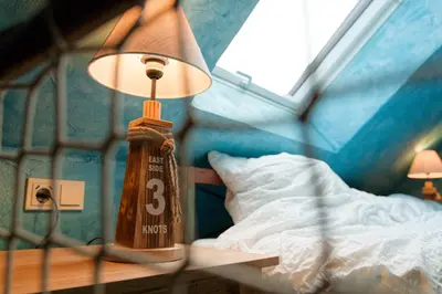 Ein Bett oder Betten in einem Zimmer der Unterkunft Nautilus