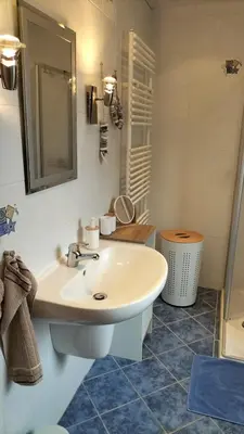 Ein Badezimmer in der Unterkunft FeWo Weismark