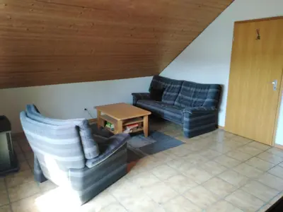 Ein Sitzbereich in der Unterkunft Gästehaus Silbersbach