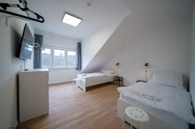 Ein Bett oder Betten in einem Zimmer der Unterkunft DQ03 - Geräumige Monteurwohnung Koblenz