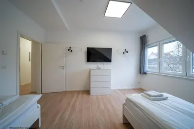 Ein Bett oder Betten in einem Zimmer der Unterkunft DQ03 - Geräumige Monteurwohnung Koblenz