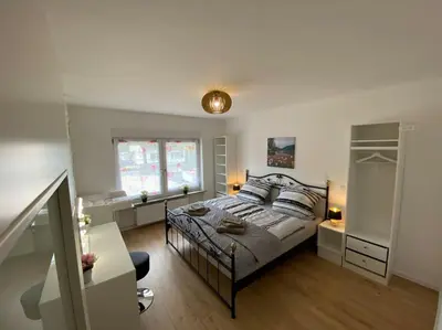 Ein Bett oder Betten in einem Zimmer der Unterkunft Krune Ferienwohnung