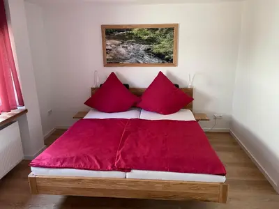Ein Bett oder Betten in einem Zimmer der Unterkunft Ferienwohnung Bröder