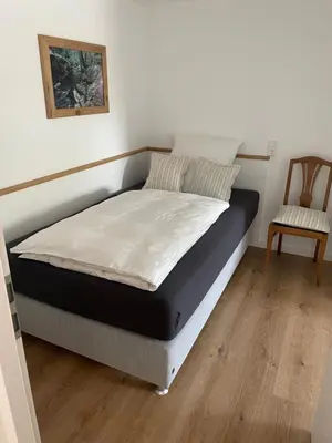 Ein Bett oder Betten in einem Zimmer der Unterkunft Ferienwohnung Bröder