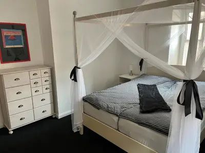 Ein Bett oder Betten in einem Zimmer der Unterkunft Hubertushaus