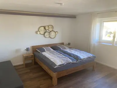 Ein Bett oder Betten in einem Zimmer der Unterkunft Haus in Esch