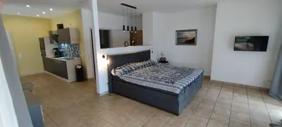 Ein Bett oder Betten in einem Zimmer der Unterkunft Fichtennest